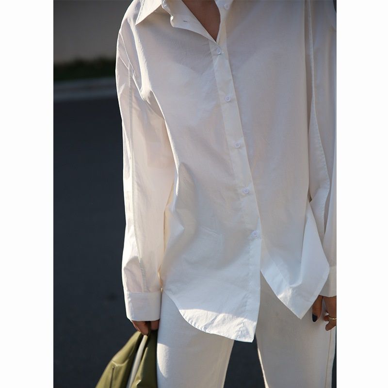 2020 spring women's loose design sense long sleeve shirt Korean new BF style off shoulder sleeve shirt casual top