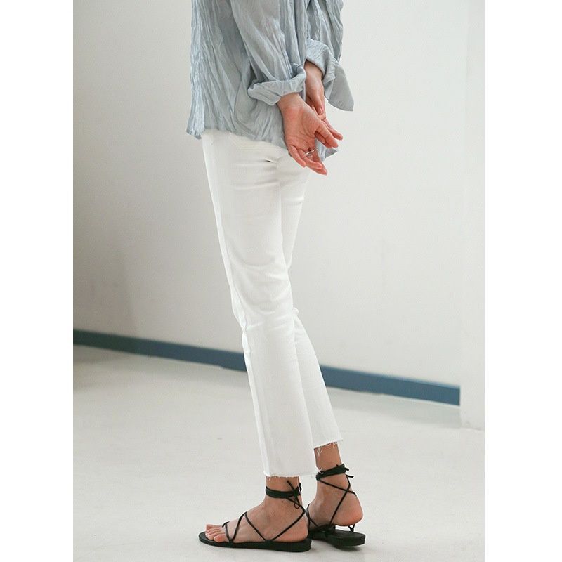 Mulan 2020 spring women's new Korean women's jeans fashion temperament raw straight trousers wholesale 7790