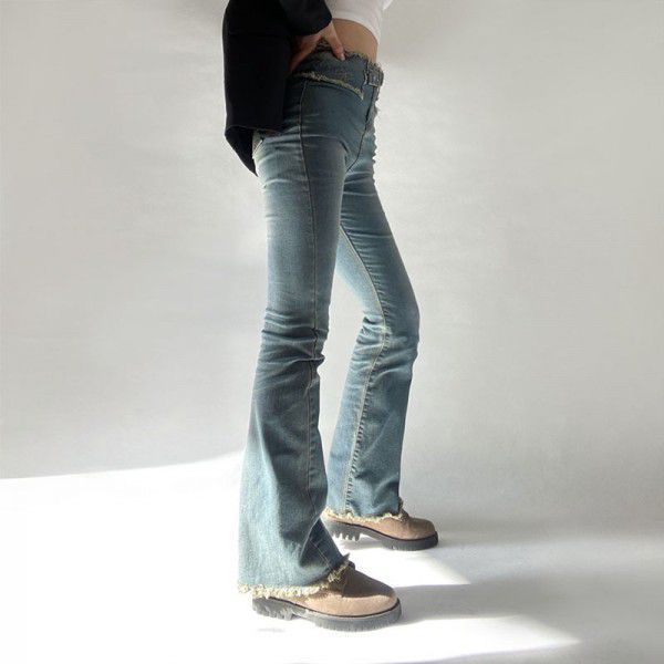 High waisted jeans with butterfly embroidery and rough edges, slim fitting, washed retro blue micro flared pants for women